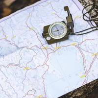 This page provides essential skills for combining a map and compass, ensuring you can navigate reliably through challenging environments.