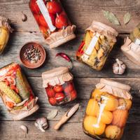 Learn various methods to preserve your garden harvest, ensuring that you can enjoy fresh produce all year long. This guide covers canning, freezing, drying, fermentation, and root cellaring.