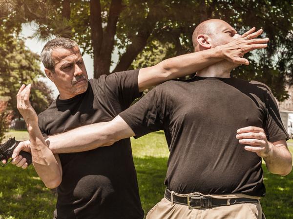 Self-defense techniques against a gun